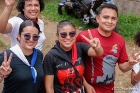 Militantes sandinistas participan en caminata en honor al Repliegue Táctico a Masaya