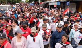Militantes sandinistas participan en caminata en honor al Repliegue Táctico a Masaya