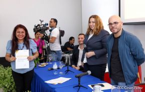 Comunicadores de la Agencia Sputnik con  Medios del Poder Ciudadano