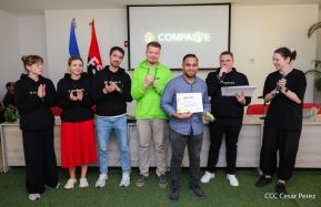 Comunicadores de RT y periodistas de Poder Ciudadano en intercambio de aprendizajes