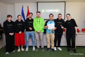 Comunicadores de RT y periodistas de Poder Ciudadano en intercambio de aprendizajes